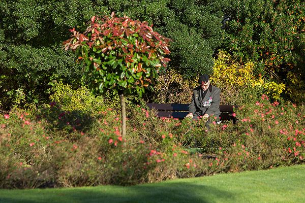 ©Neil Turner, November 2014. An ex-serviceman take a few minutes to himself at The Cenotaph in Bournemouth in the November sunshine ahead of the Service of Remembrance.