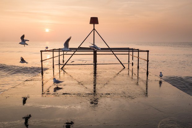 ©Neil Turner, January 2015. Early morning wintery sunshine on the beach at Bournemouth.