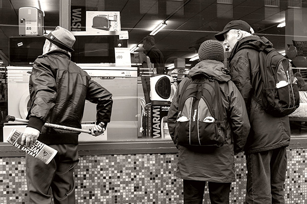 New layer added and a tone applied across the image using the paint bucket tool at 12% before the levels were adjusted to re-introduce a black.