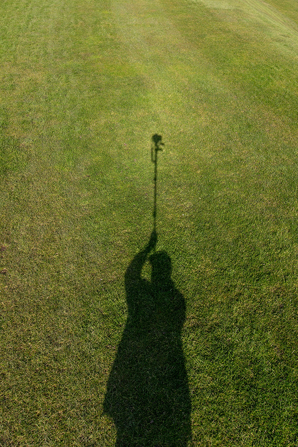 My shadow using a monopod to get a high angle picture. March 2016 ©Neil Turner